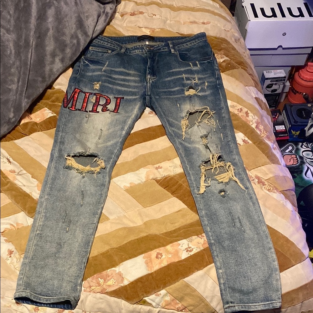 AMIRI Blue Skinny Distressed Jeans